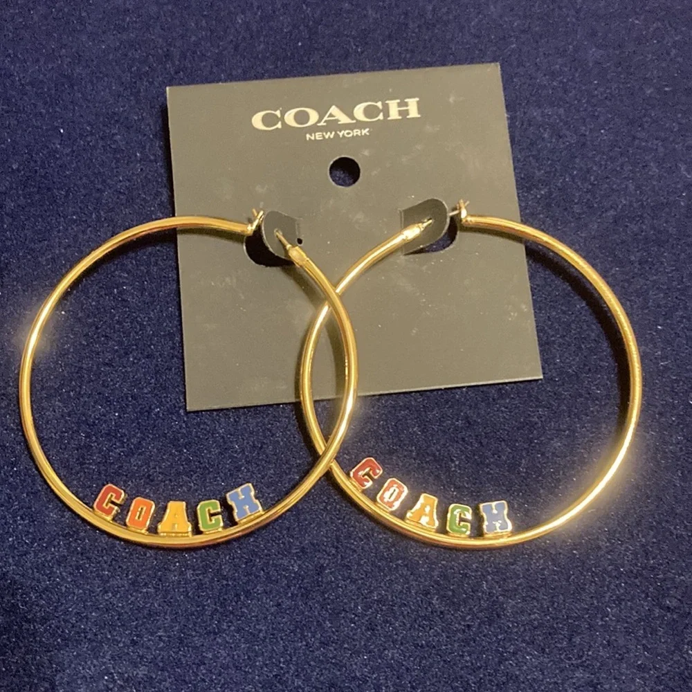 NWT Gold tone large hoop lever back earrings w/multicolored block letter  logo - Picture 2 of 6